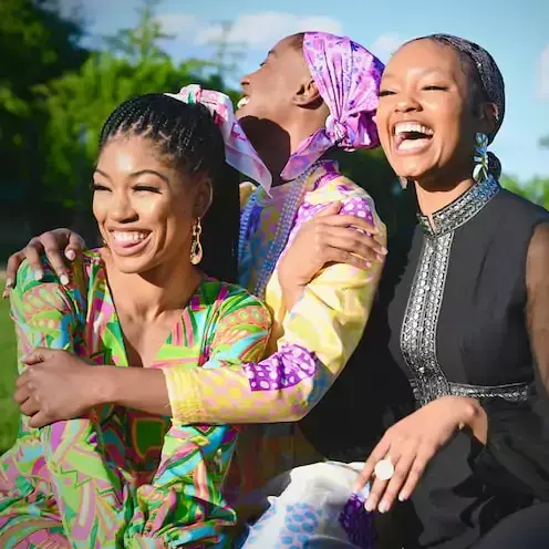 Group of friends laughing together that represent Mandisa Sishi.